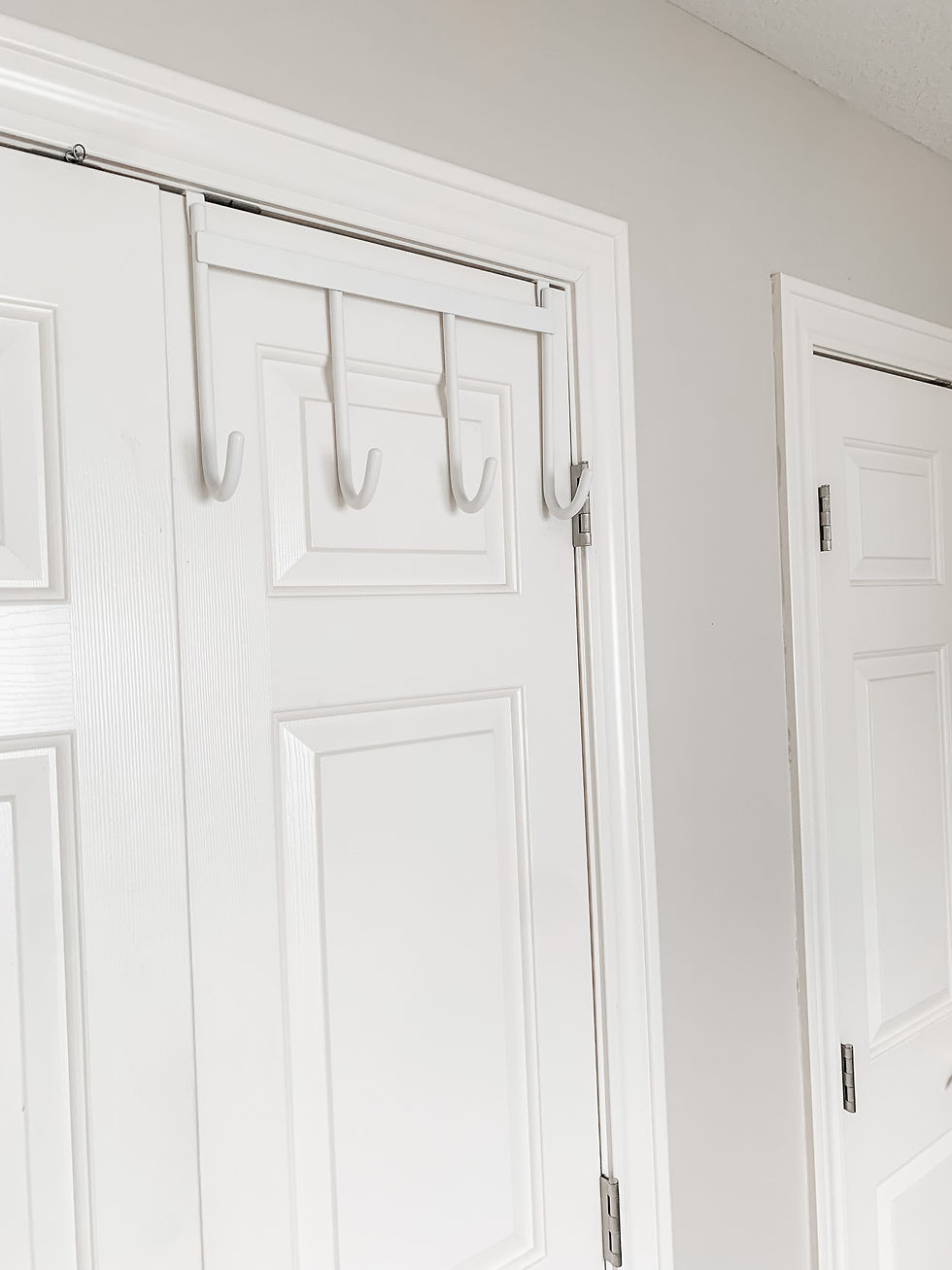 Over the Door Hanging Hooks in Guest Room