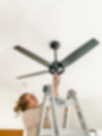 Kiersten installing new ceiling fan