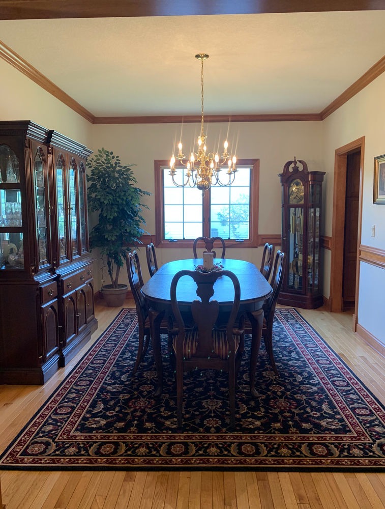 Updating the Dining Room with a New Chandelier and Window Treatments