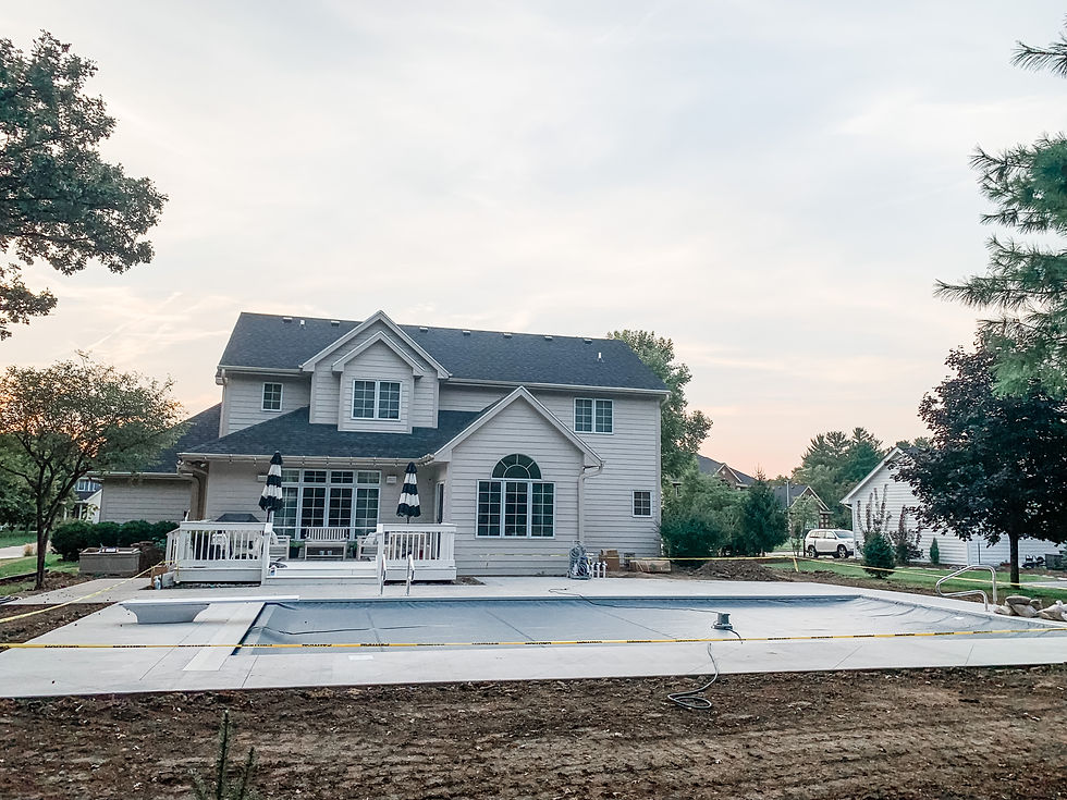 backyard with auto cover on pool