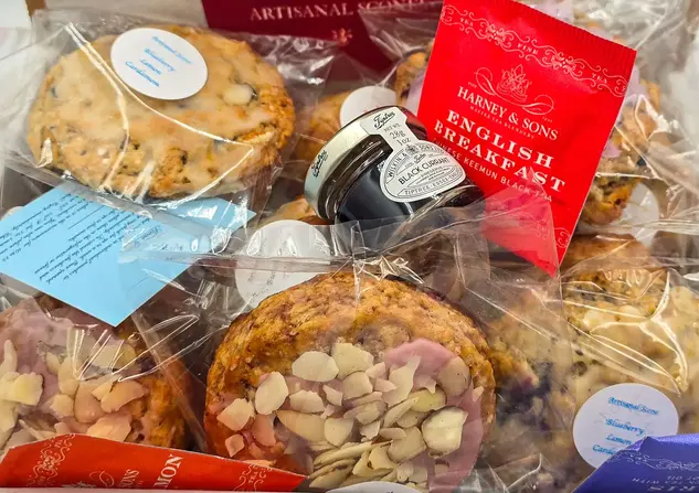 Deluxe scone selection with assorted flavors and Deluxe scone selection with assorted flavors and gourmet jam.
