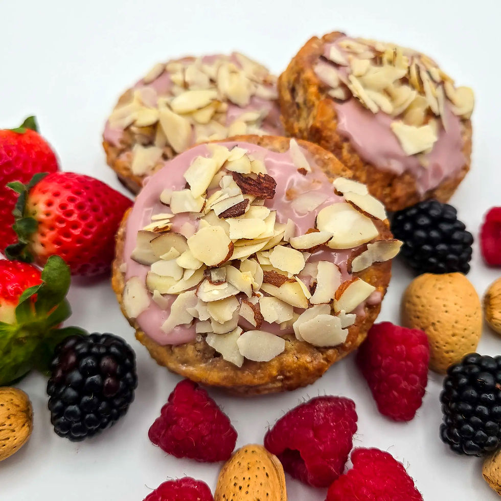 Mixed berry, almond scone, surrounded by strawberries, blackberries, raspberries, and almonds.