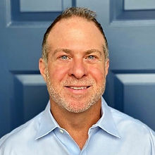 Ron blue shirt headshot.jpg