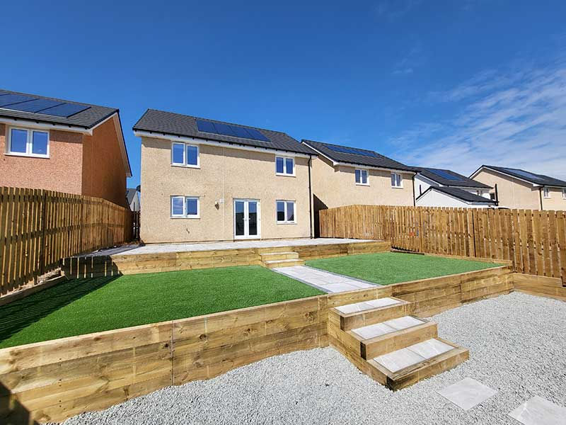 New house with garden and solar panels