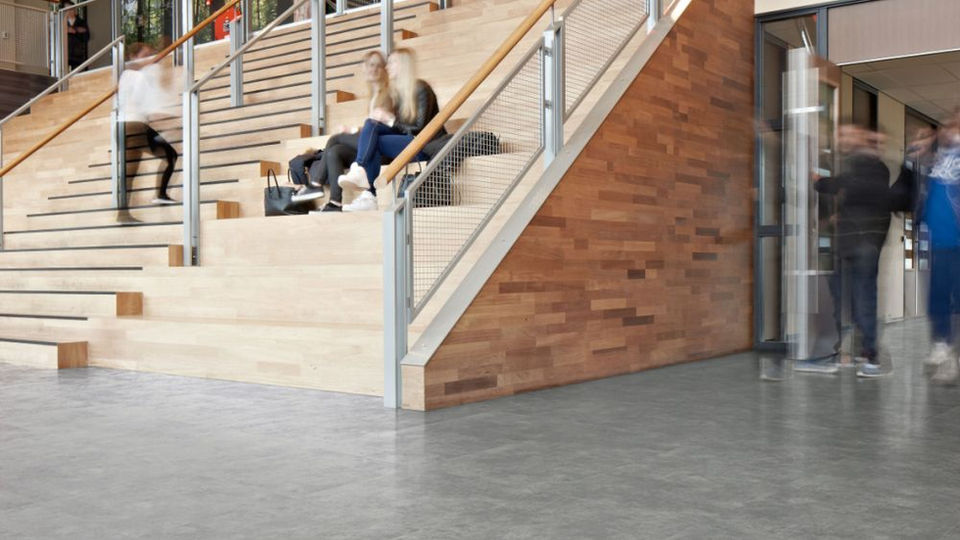 People on wooden staircase