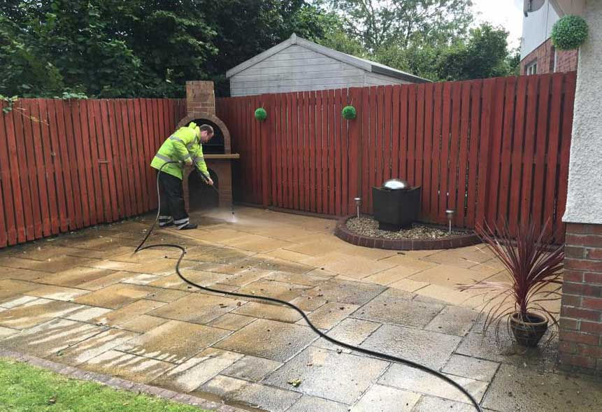 pressure washing a patio