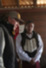 Eddie with director Raen LeVell during filming on a Western movie set.
