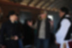Raen LeVell with Eric Nelsen and Eddie Spears during filming inside a Western movie set.