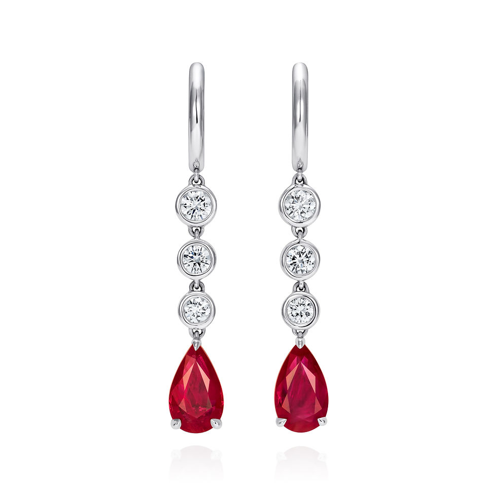 Ruby & Diamond Earrings in 18K white gold, featuring vivid red rubies surrounded by a halo of round brilliant-cut diamonds
