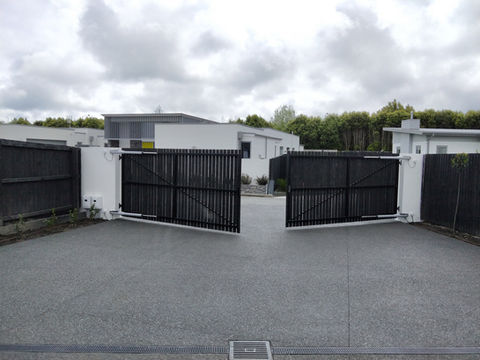 Double swinging automatic gates using Centurion V500 motors and Centurion Air Keypad  installed by Designer Gates in North Canterbury