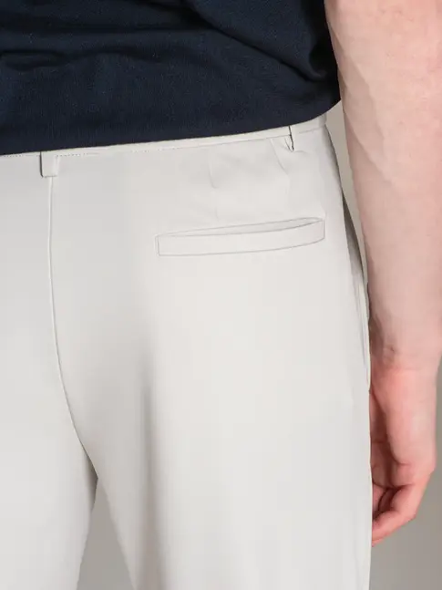 Men’s yacht trousers paired with technical shirt for smart uniform
