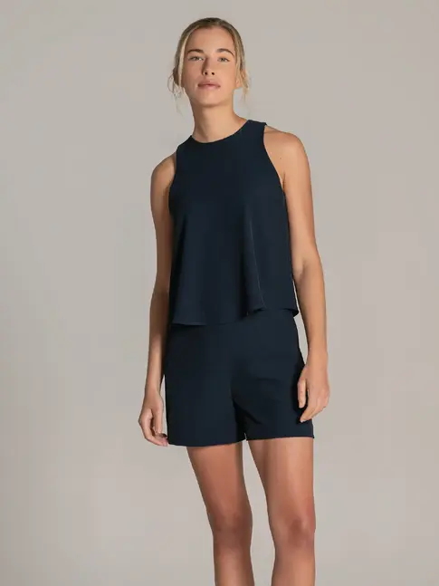 Elegant sleeveless top styled for superyacht interior service
