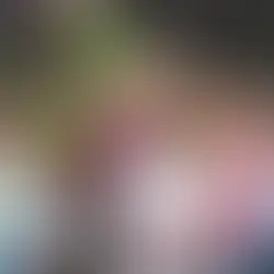 Happy preschool children holding vegetables in the garden