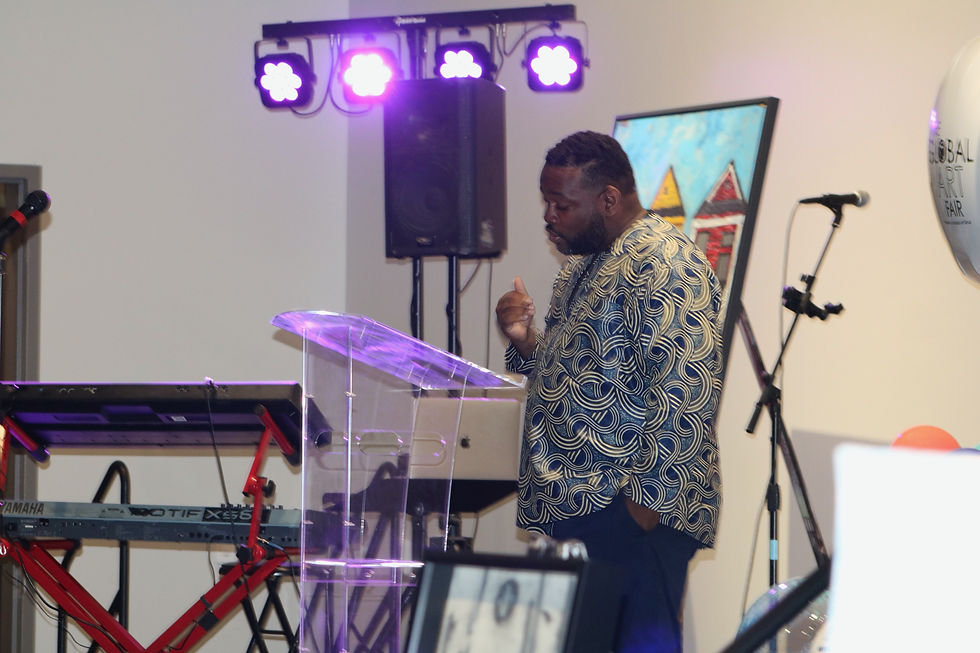 Dr. Ed Garnes performing at The Global Art Fair 2025