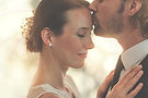 Bride and groom embrace