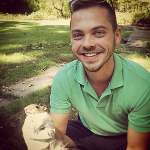 Josh Holding a baby grey Squirrel