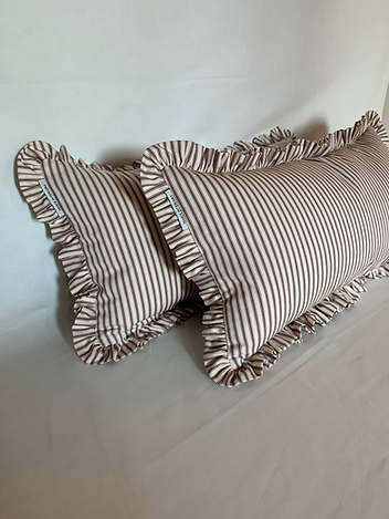 rectangular ticking stripe cushion with feather pad and ruffle fring edge