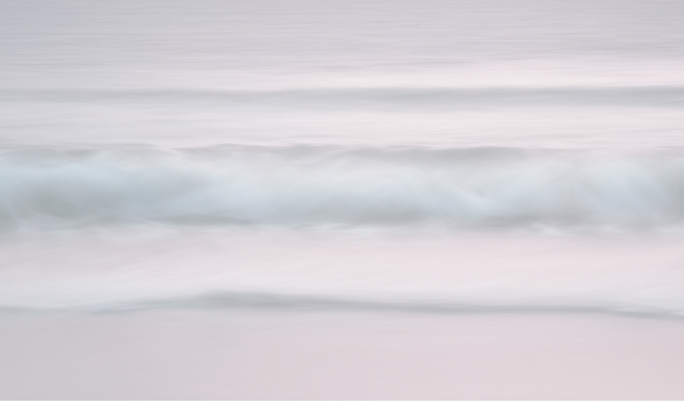 muted colours gentle movement of sea with pinks and blue hues no sky just water_edited_edi