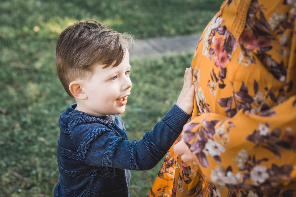 maternity lifestyle photoshoot melbourne - son touching mother's pregnant belly