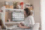 Gill Cook works at her desk - perosnal branding photography melbourne.
