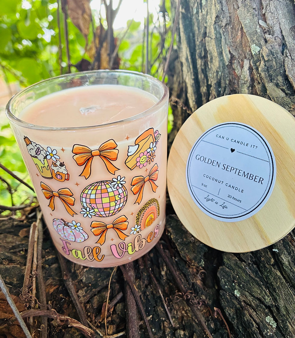Golden September Fall Vibes coconut candle beside its wooden lid outdoors