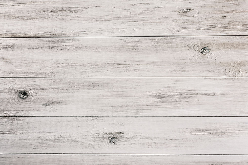 White wooden planks background. Horizontal lines create a simple, clean, and textured surface.