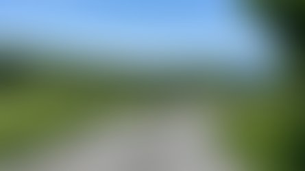 guest walking peascefully down hangearth farm road mountains in background