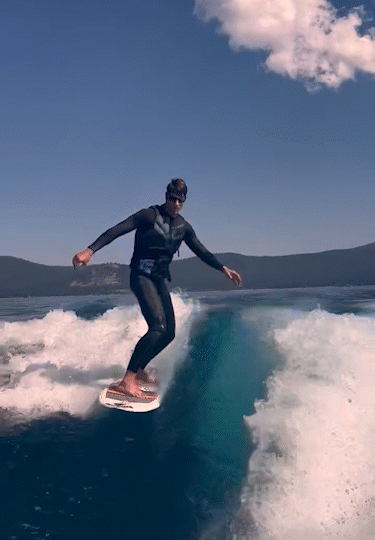 Wake Boarder riding wave