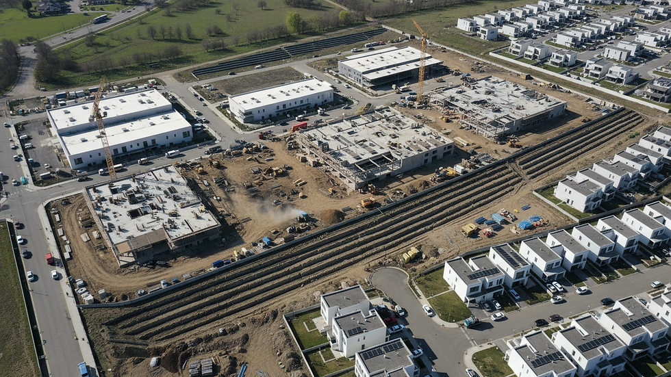 High angle view of a drone capturing a commercial construction site
