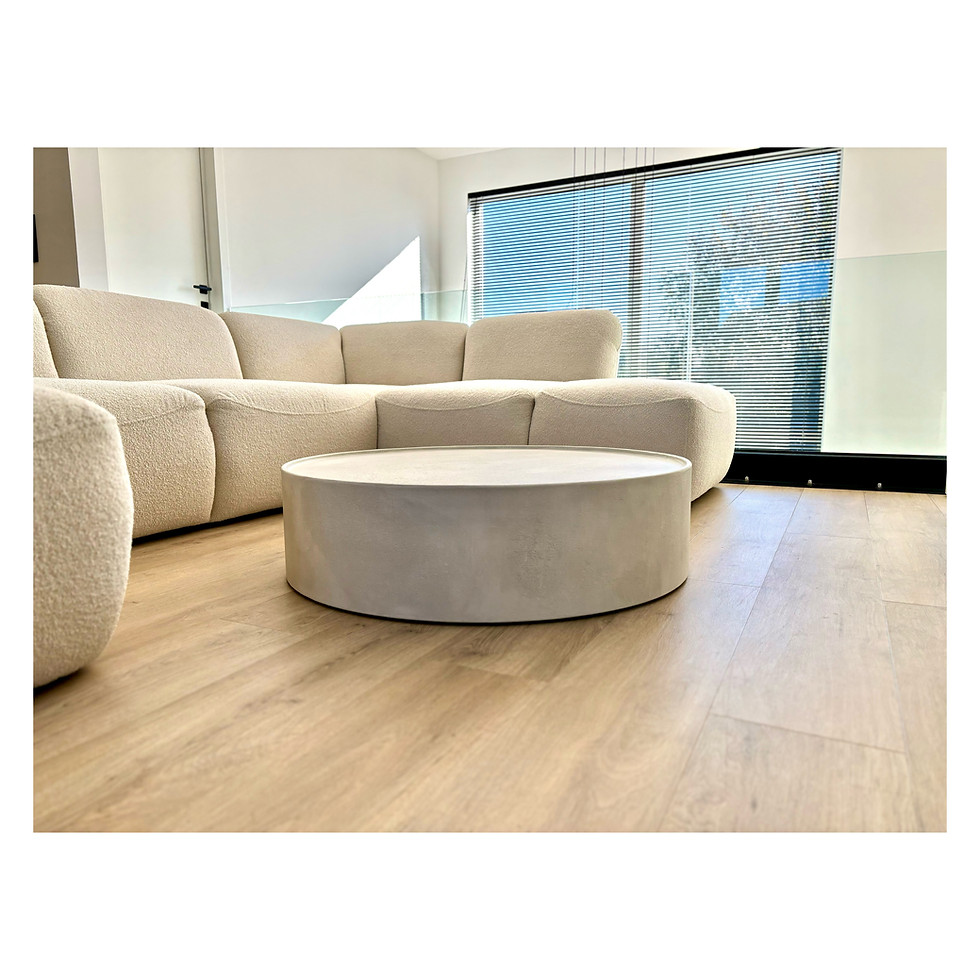 Thumbnail: Microcement salontafel rond vormgegeven