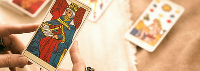 high-angle-woman-reading-tarot (2)_edited.jpg