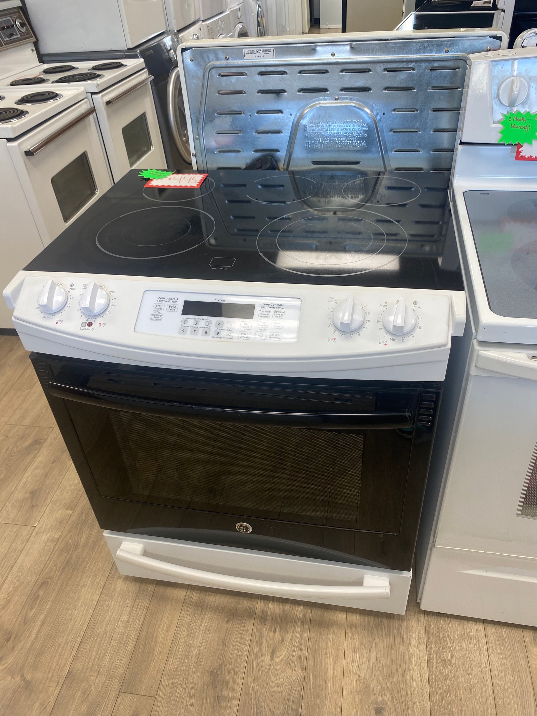 GE 30” black and white glass top stove 