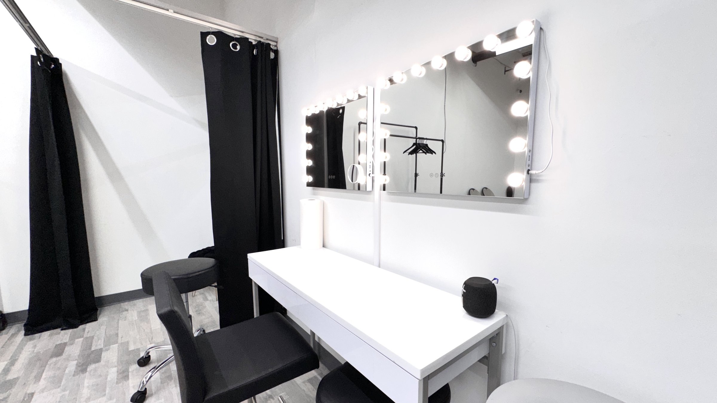 Glam station with lighted vanity mirrors