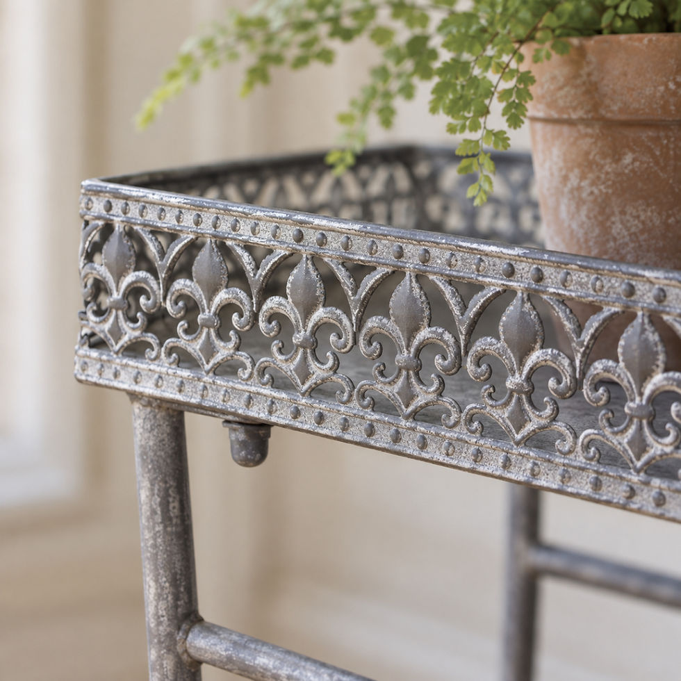 Thumbnail: Close-up of ornate pierced metal tray edge and aged grey finish on garden side table