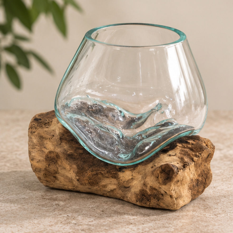 Molten Glass Bowl on Dark Wood – Small recycled molten glass vessel shaped over natural wood