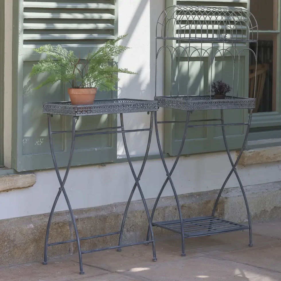 Thumbnail: Decorative grey metal side table with ornate tray top in a heritage country house