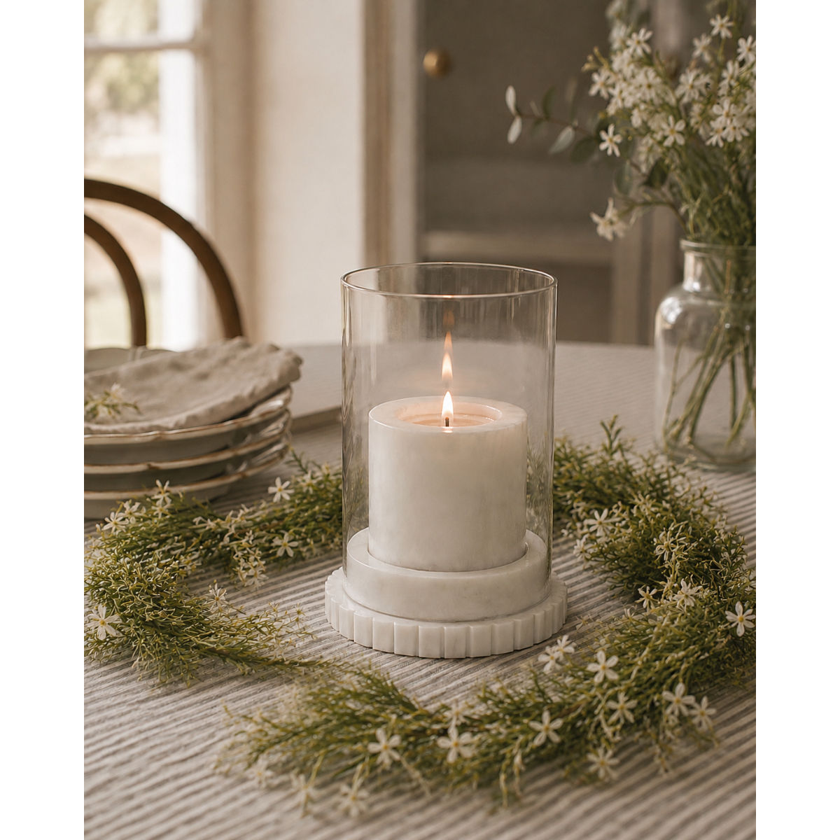 Makrana Marble Hurricane Lamp with natural stone base and clear glass cylinder.