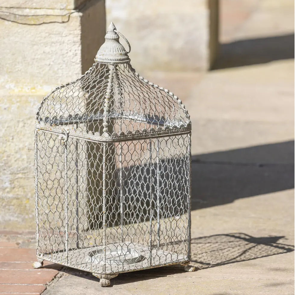 Thumbnail: Decorative metal candle lanterns styled beside a traditional country house entrance