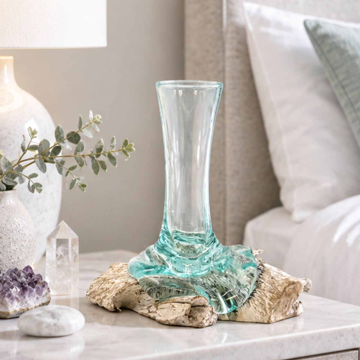 Molten Glass Vase on Whitewashed Wood – Small recycled molten glass vase on natural wood base styled beside a bed
