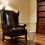 Thumbnail: william morris snakeshead gold trim waste paper bin in a library with leather reading chair