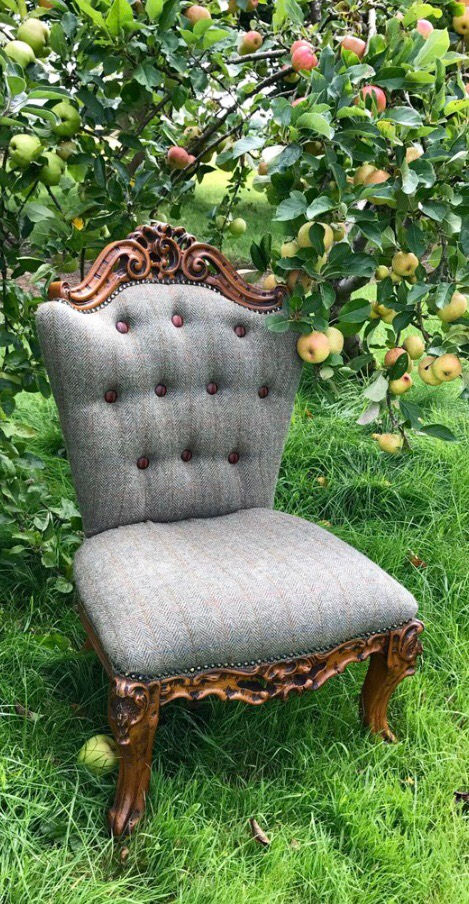 Thumbnail: Genuine Harris Tweed reupholstered chair with beautiful carved wooden detailing and leather buttons complete with renaissance