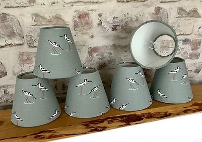 Selection of candle clip lampshades with Sophie Allport Coastal Bird fabric design