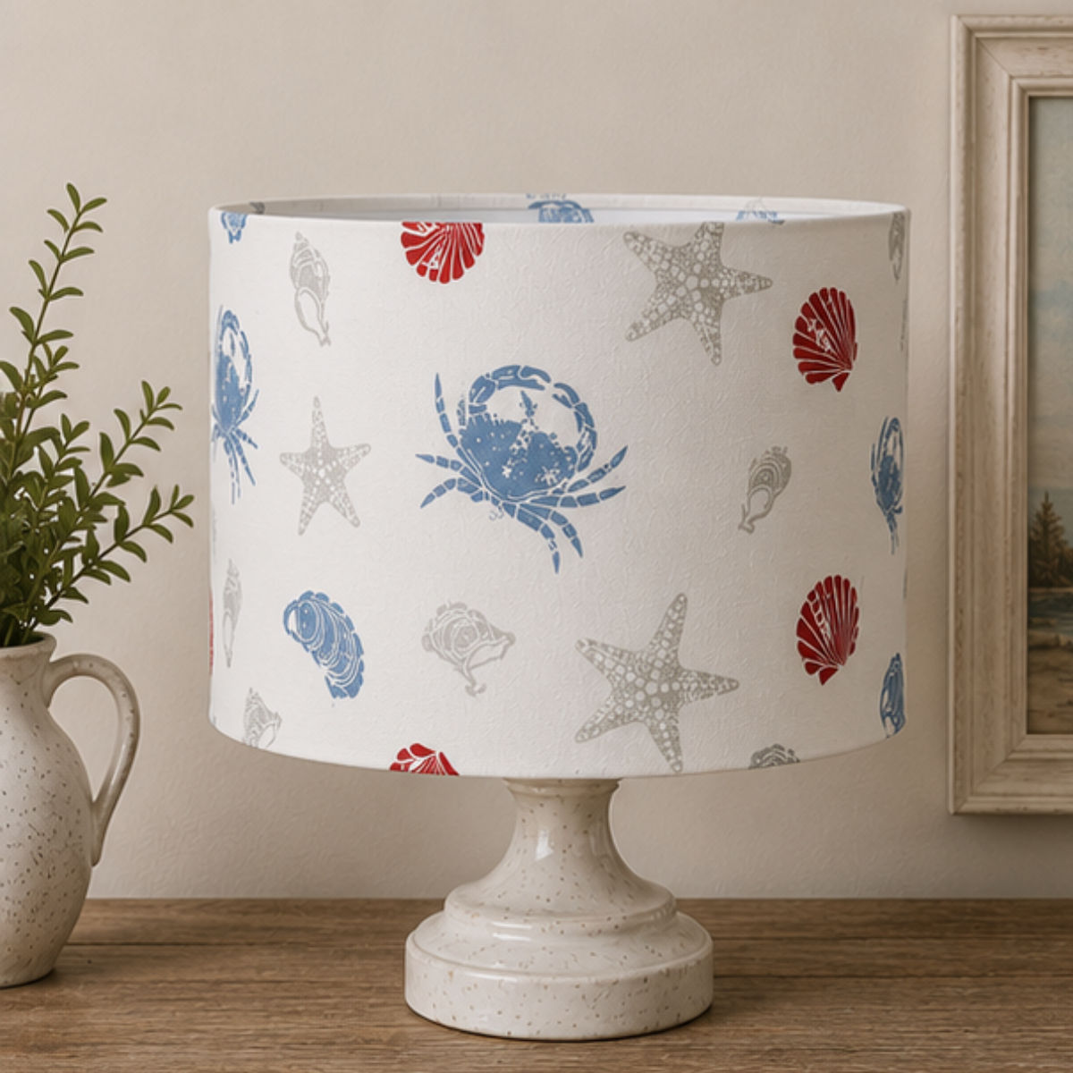 Handmade Offshore lampshade featuring coastal shell, starfish and crab print fabric for seaside and coastal interiors