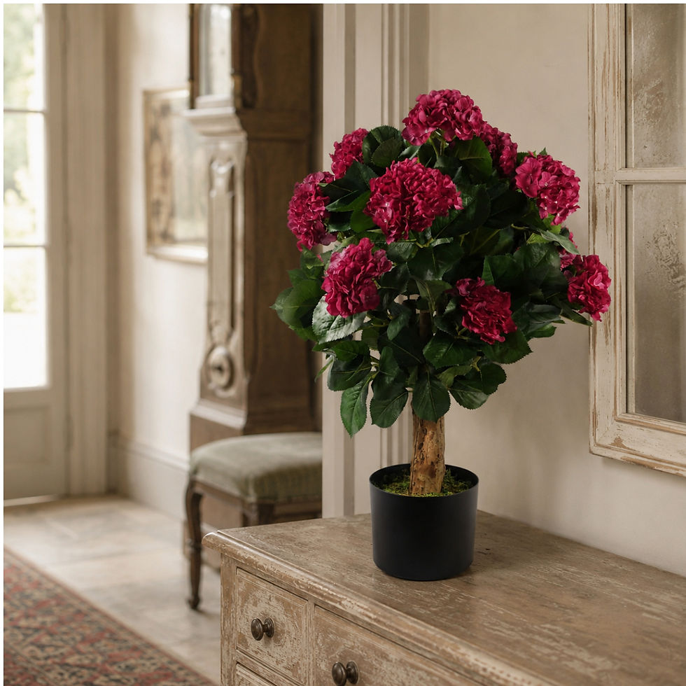 Thumbnail: Pink artificial hydrangea in a decorative planter on a wooden country-house hall console.
