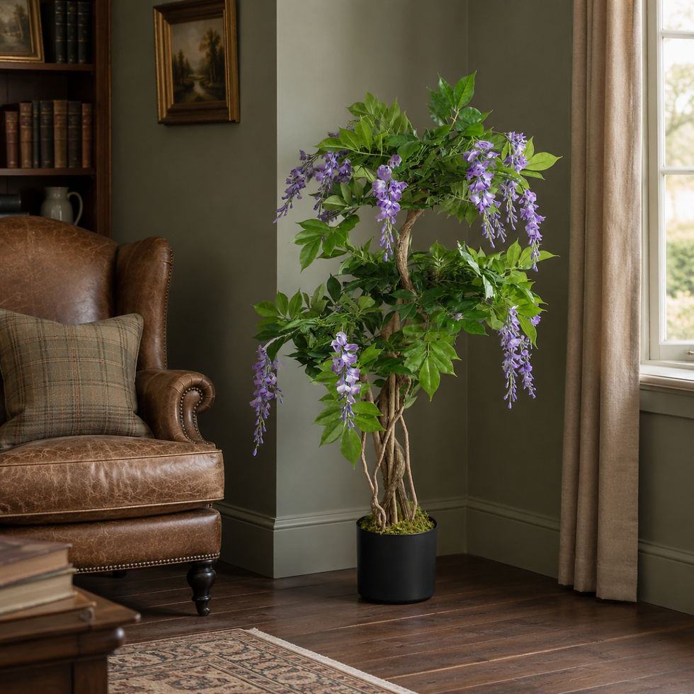 Thumbnail: Artificial purple wisteria displayed beside an upholstered reading chair against muted green walls.