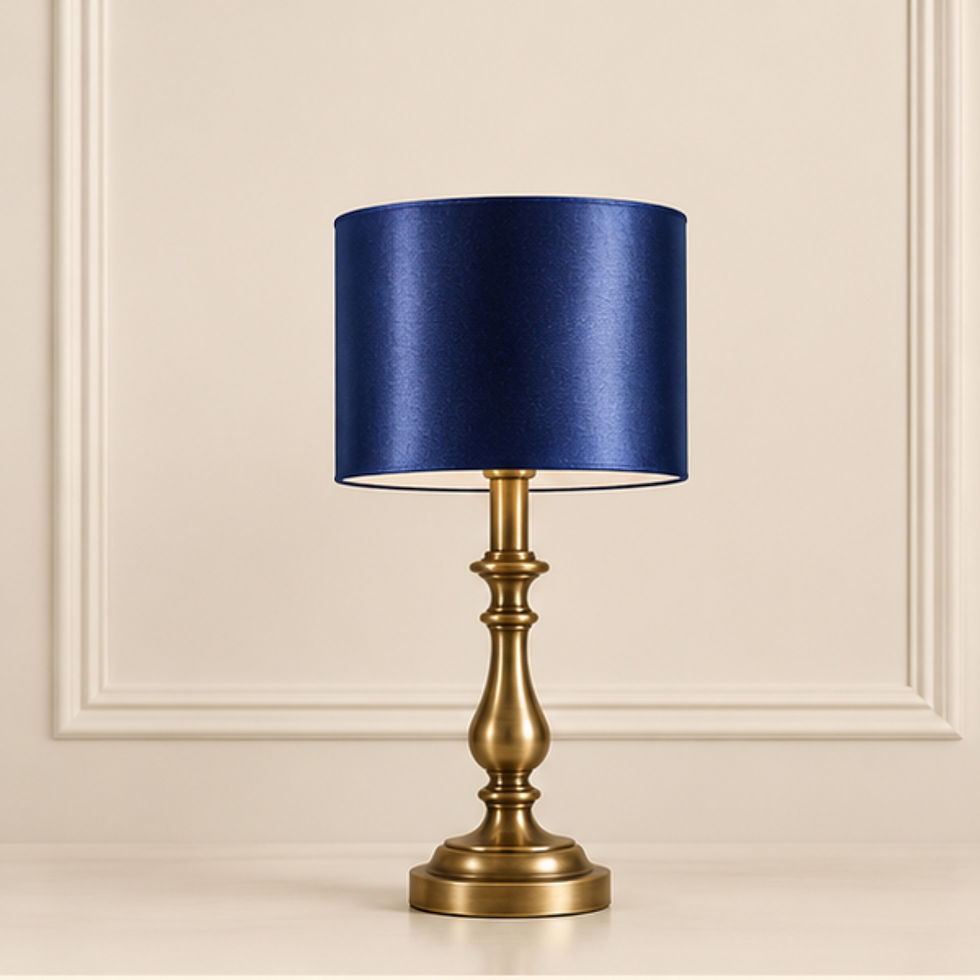 20cm: 20cm Navy silky satin drum lampshade on a classic brass table lamp by Berry & Grouse.