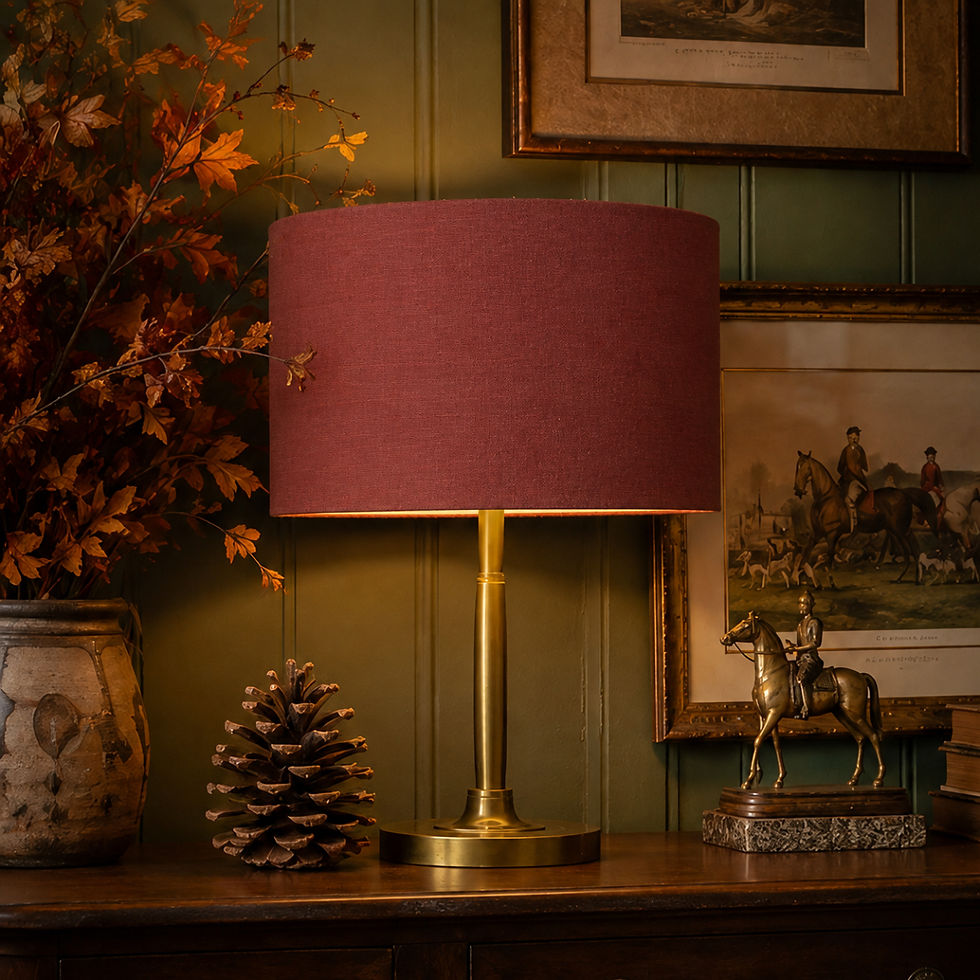 Thumbnail: Deep russet red textured cotton drum lampshade styled with brass and dark timber