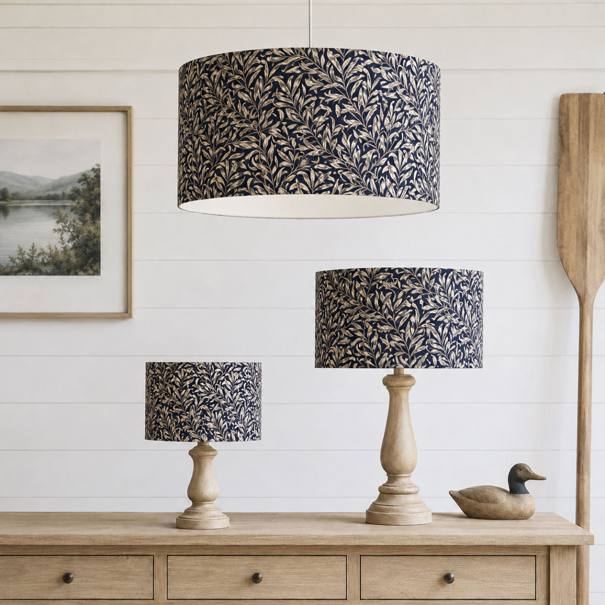 william morris willow bough navy blue candle clip lampshades and drum lampshades set within the lakehouse