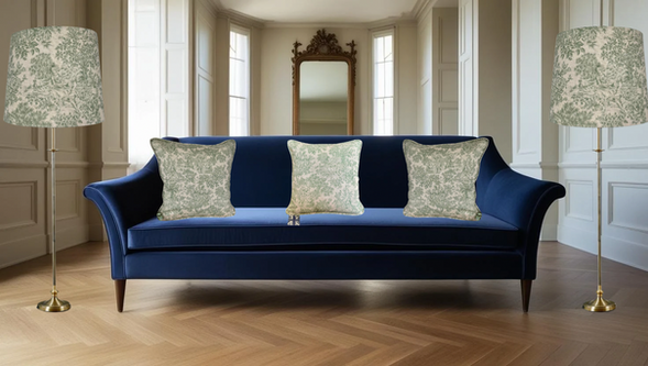Zen Toile Green Linen Empire floor/standard lamp lampshades with matching scatter cushions on a blue sofa