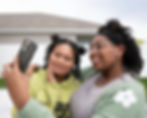 Vloggers taking a selfie on a smartphone